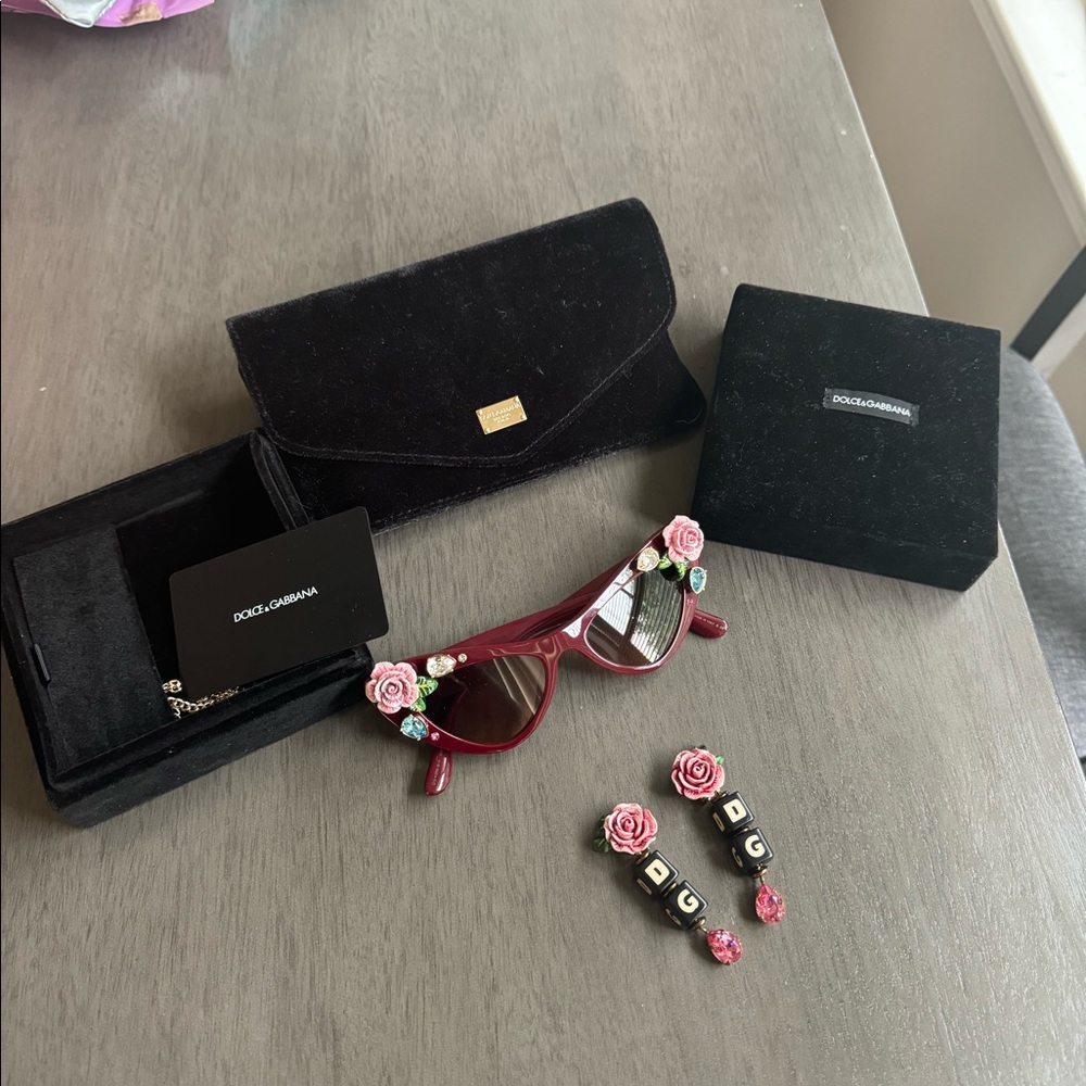 Like new dolce and GABBANA earrings and sunglasses